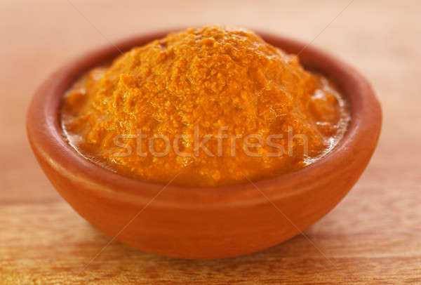 Raw turmeric paste in a bowl Stock photo © bdspn