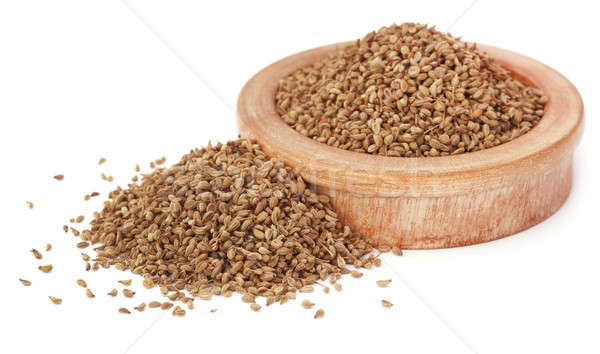 Stock photo: Ajwain seeds in a wooden bowl