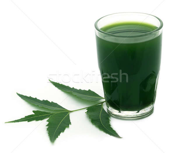 Medicinal neem leaves with extract Stock photo © bdspn