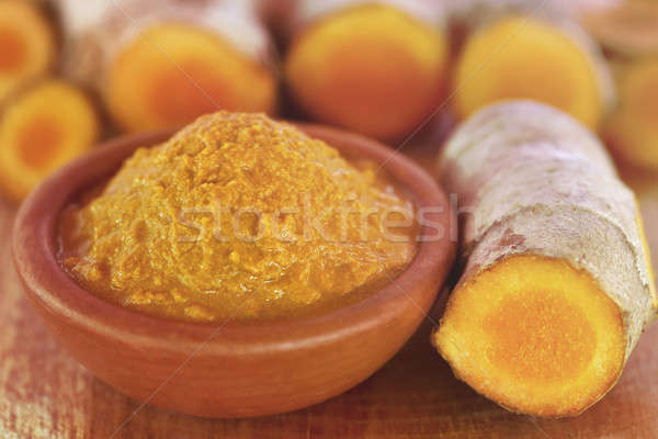 Raw turmeric paste in a bowl Stock photo © bdspn