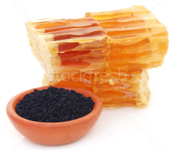 Honey with black cumin in a pottery Stock photo © bdspn