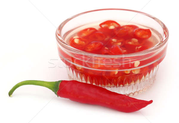 Red chili peppers in a transparent bowl Stock photo © bdspn