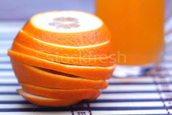 Orange juice with sliced orange Stock photo © bdspn