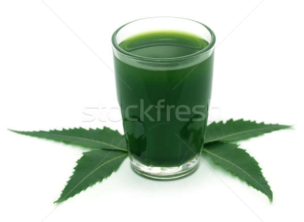 Medicinal neem leaves with extract Stock photo © bdspn