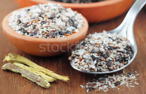Medicinal herbs on a wooden surface Stock photo © bdspn