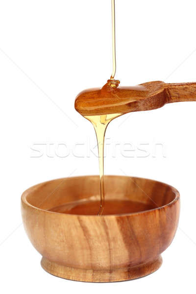 Dripping honey  Stock photo © bdspn