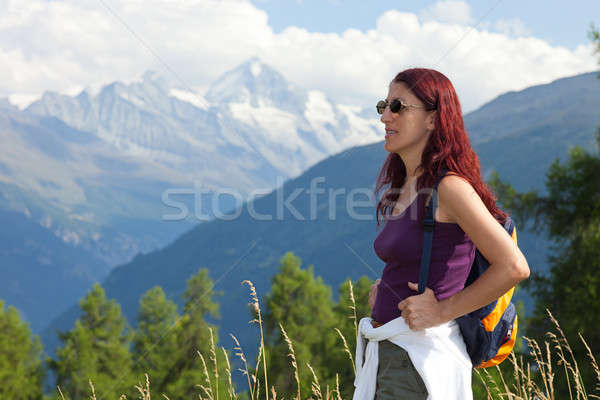 Woman Hiker In Alps. Stock photo © belahoche