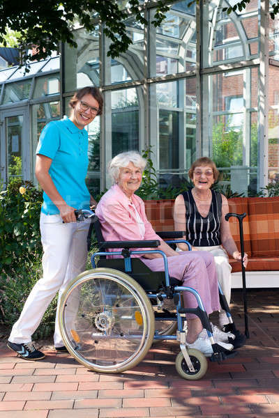 Glimlachend gezondheidszorg professionals ouderen zorg Stockfoto © belahoche