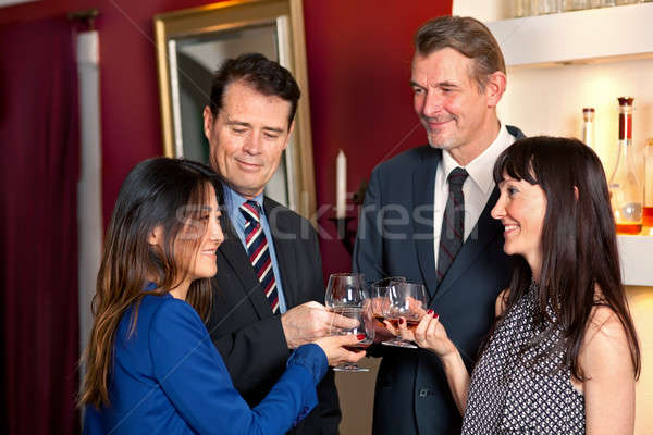 Business people at party. Stock photo © belahoche