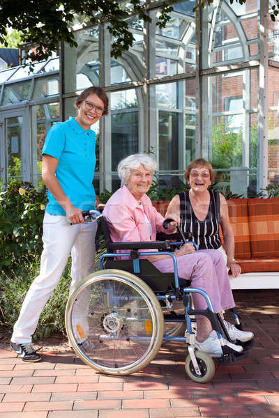 Happy Caregivers and Elderly Portrait Stock photo © belahoche