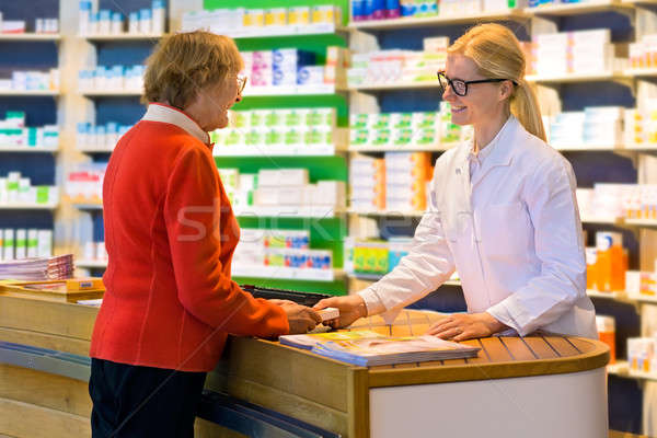 Vásárló gyógyszer gyógyszerész boldog idős személy piros Stock fotó © belahoche