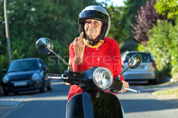Senior woman showing the finger Stock photo © belahoche