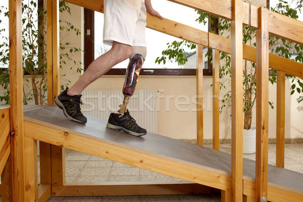 Male prosthesis wearer training on slopes Stock photo © belahoche