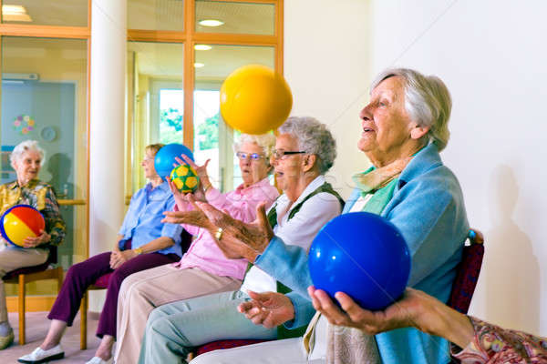 Senior ladies doing coordination exercises Stock photo © belahoche