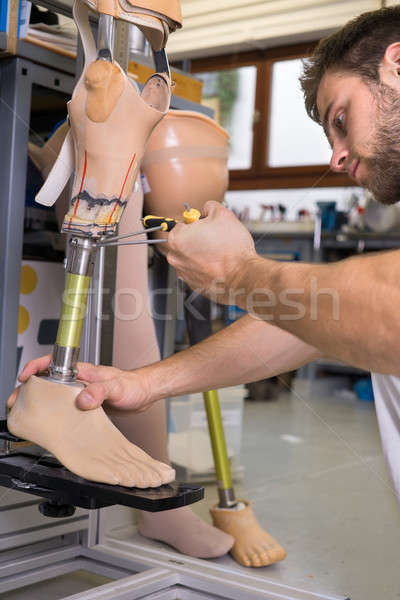 Close up of man adjusting false limb Stock photo © belahoche
