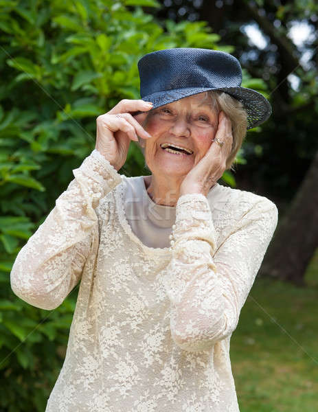 Riendo ancianos dama sombrero retrato Foto stock © belahoche