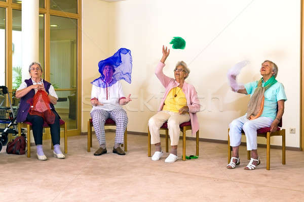 Senior ladies having fun while exercising Stock photo © belahoche