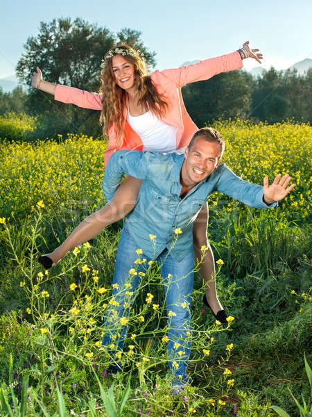 Feliz animado equitación atrás Foto stock © belahoche