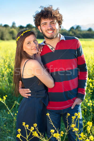 Smiling beautiful romantic couple Stock photo © belahoche