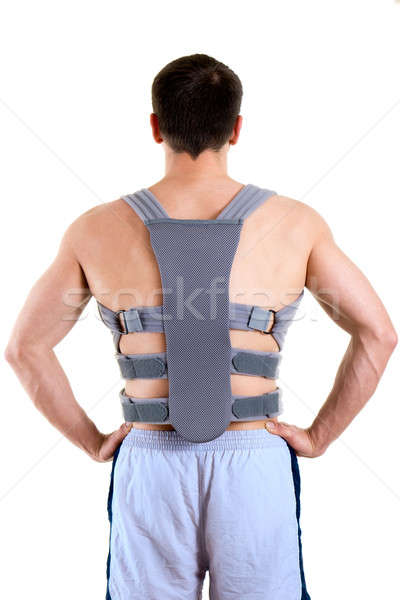 Athletic Man Wearing Supportive Back Brace Stock photo © belahoche