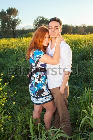 Romantic young couple enjoy a tender moment Stock photo © belahoche