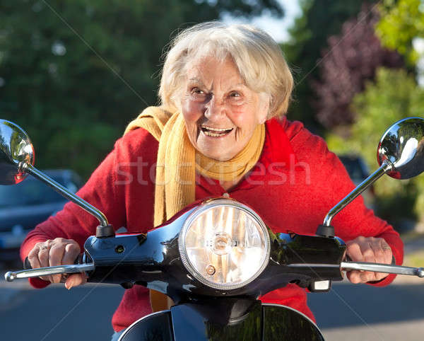 Idős nő száguld moped közelkép bicikli Stock fotó © belahoche