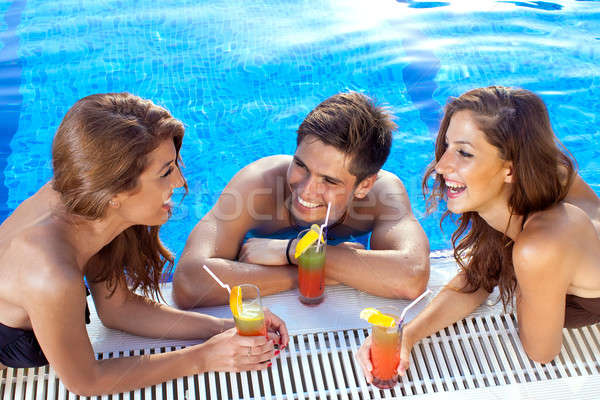 Cara duas mulheres piscina boa aparência potável Foto stock © belahoche