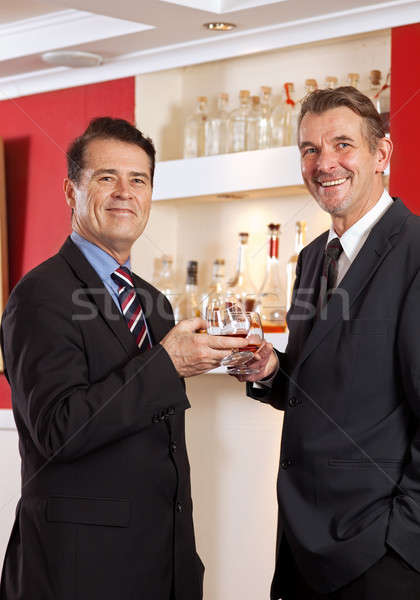 Friends celebrating. Stock photo © belahoche