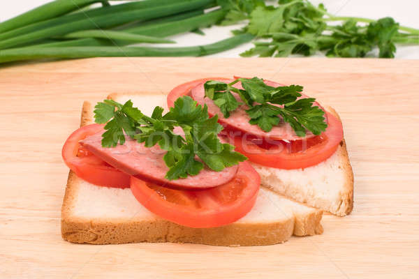 Sandwiches savoureux saucisse tomates herbes groupe [[stock_photo]] © bendzhik