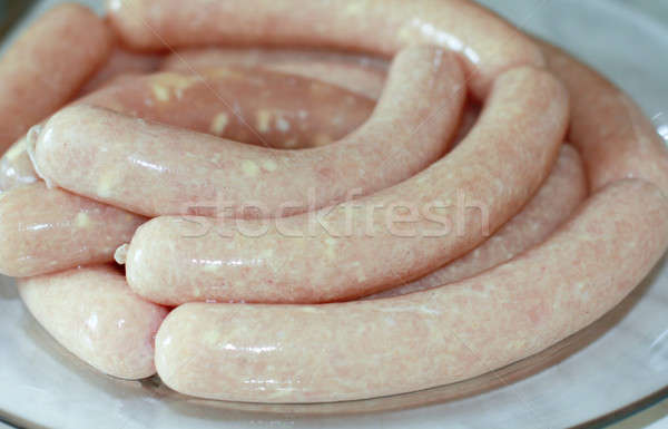 Homemade chicken sausages Stock photo © bendzhik