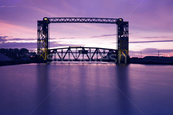 Sunset, bridge and two lighthouses Stock photo © benkrut
