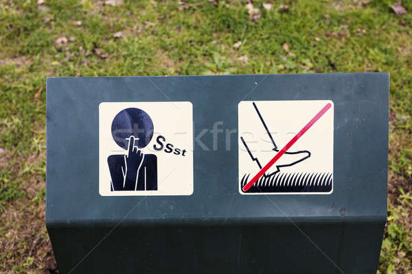 Keep quiet and don't walk on lawn signs Stock photo © benkrut
