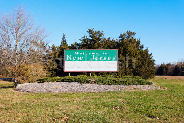 Bienvenida Nueva Jersey senalización de la carretera árbol carretera verde Foto stock © benkrut