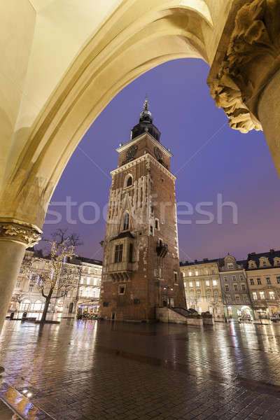Cracovia città piazza piovosa sera albero Foto d'archivio © benkrut