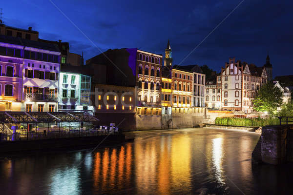 Old town of Opole across Oder River Stock photo © benkrut