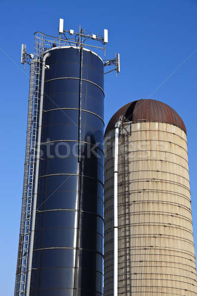 Cell antennas mounted on the top of the silo Stock photo © benkrut