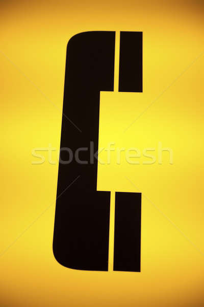 Yellow telephone sign Stock photo © benkrut