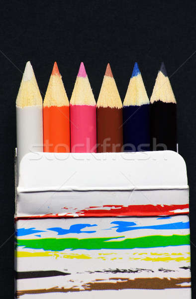 Color pencils in paper box Stock photo © berczy04