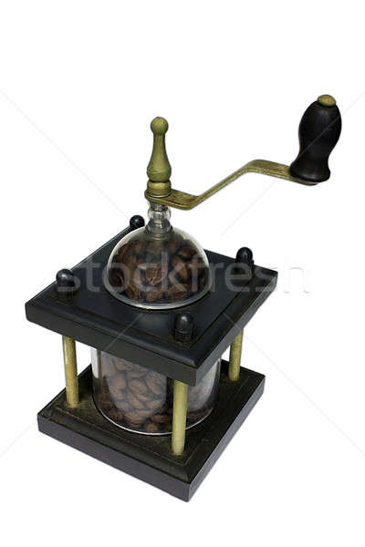 Stock photo: Old coffee grinder with beans