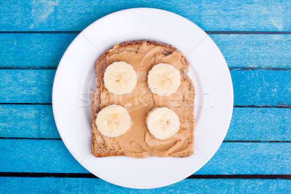 [[stock_photo]]: Pain · beurre · d'arachide · crème · bleu · bois · alimentaire