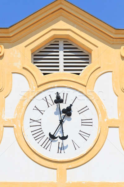 Ancient Clock on old building Stock photo © Bertl123