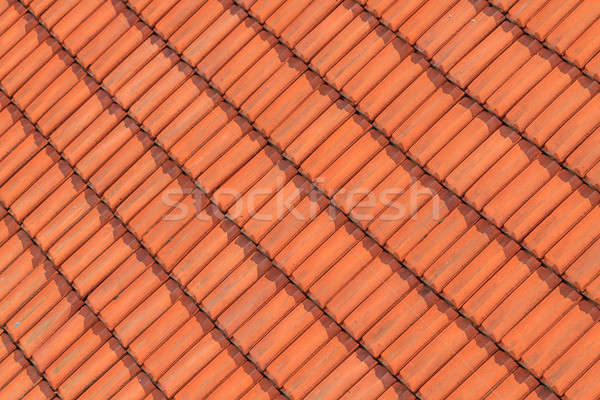 Rojo techo azulejo patrón casa Foto stock © Bertl123