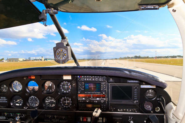 Cockpit view from small aircraft taking off from runway  Stock photo © Bertl123