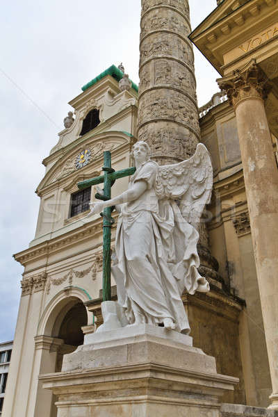 Angel statue with cross in front of Karlskirche (St. Charles's C Stock photo © Bertl123