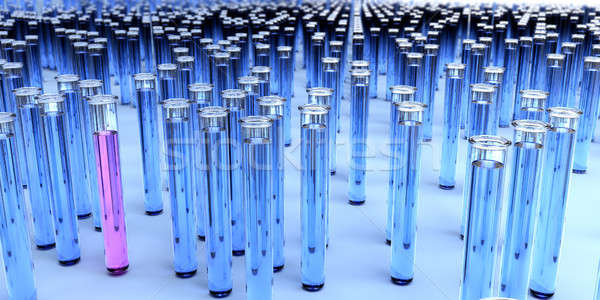 Hundreds of blue test tubes and a pink one Stock photo © bestmoose