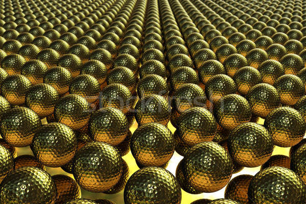 Hundreds of golden golf balls lined up on a mirror Stock photo © bestmoose