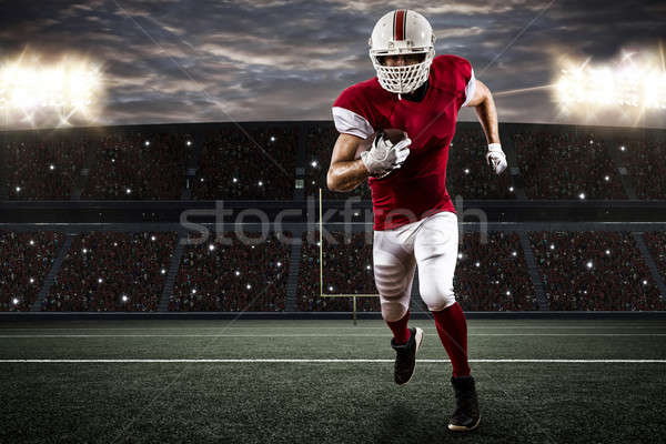 Voetballer Rood uniform lopen stadion sport Stockfoto © betochagas