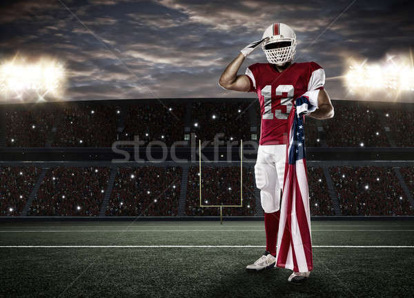 Futballista piros egyenruha amerikai zászló stadion sport Stock fotó © betochagas