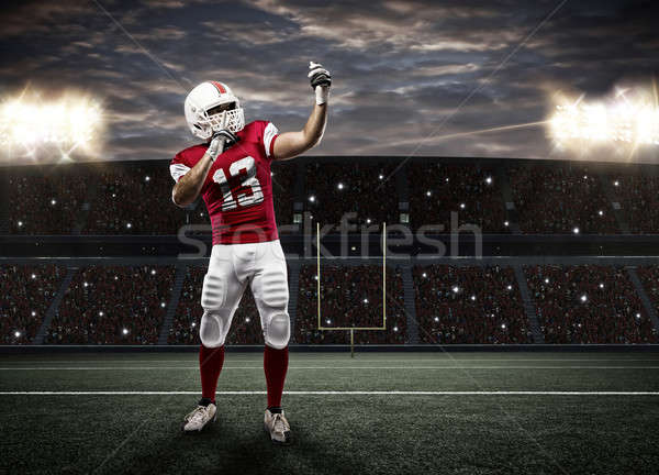 Czerwony uniform sportu mężczyzn Zdjęcia stock © betochagas
