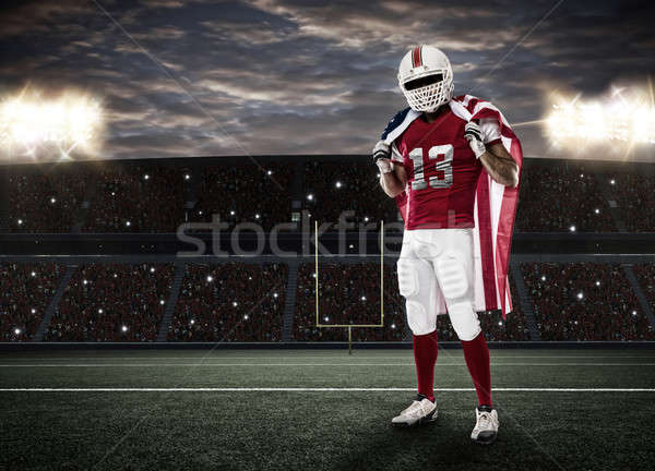 Stock fotó: Futballista · piros · egyenruha · amerikai · zászló · stadion · sport